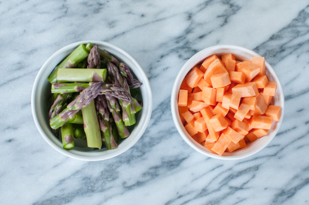 asparagus sweet potato on marble countertop