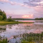 lakes region nh summer sunset on lake waukewan