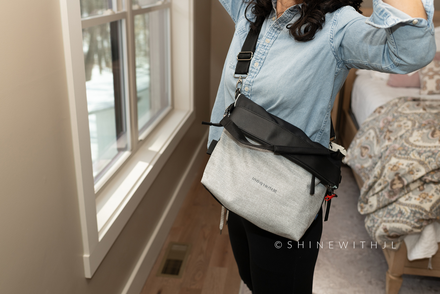 ShinewithJL wearing Sherpani Vale Crossbody Bag filled