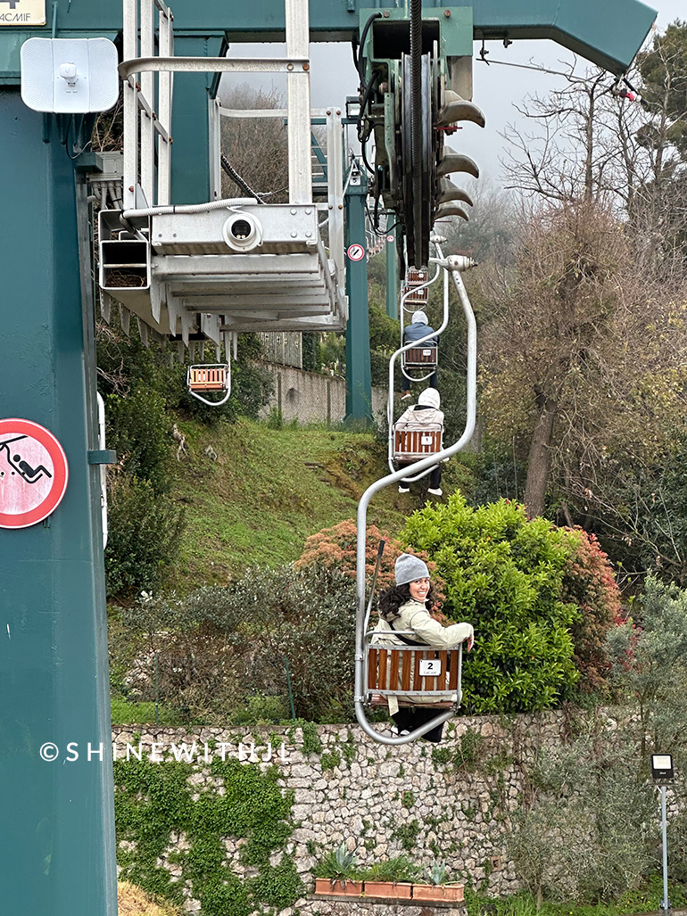 Staying dry and warm on the Monte Solaro Chair Lift in early Spring