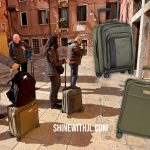 Couple rolling carry-on luggage for Italy through a Venetian alley during a 3-week trip