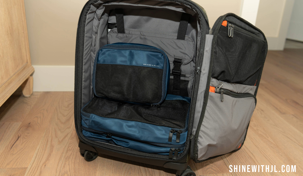Briggs and Riley 21" international carry-on packed with Briggs and Riley compression cubes