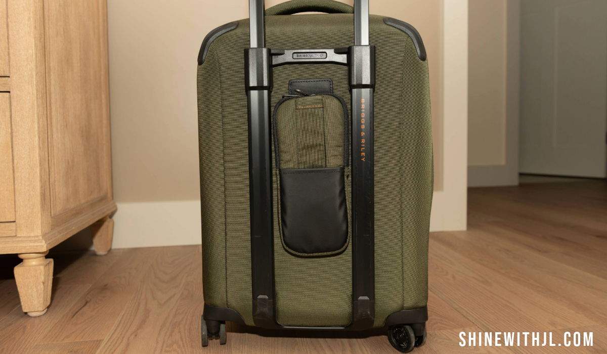 Back panel and telescoping handle of ZDX carry-on luggage used on Italy flights and trains
