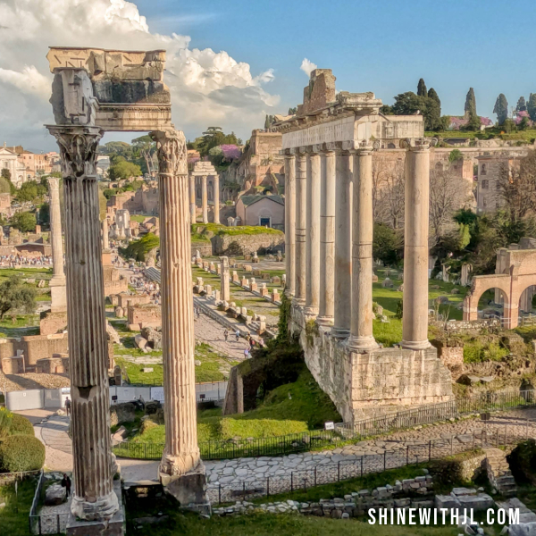 Ancient Rome Itinerary-Roman Forum Views from Capitoline Museums Panoramic afternoon view of the Roman Forum ruins under blue skies on an Ancient Rome itinerary