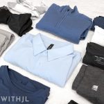 Flatlay of men’s Italy spring capsule wardrobe including tops, bottoms, shoes, and layering pieces for March and April travel.