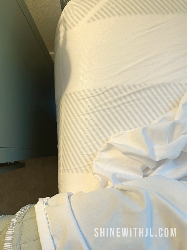 Plastic mattress cover causing overheating and poor sleep while traveling