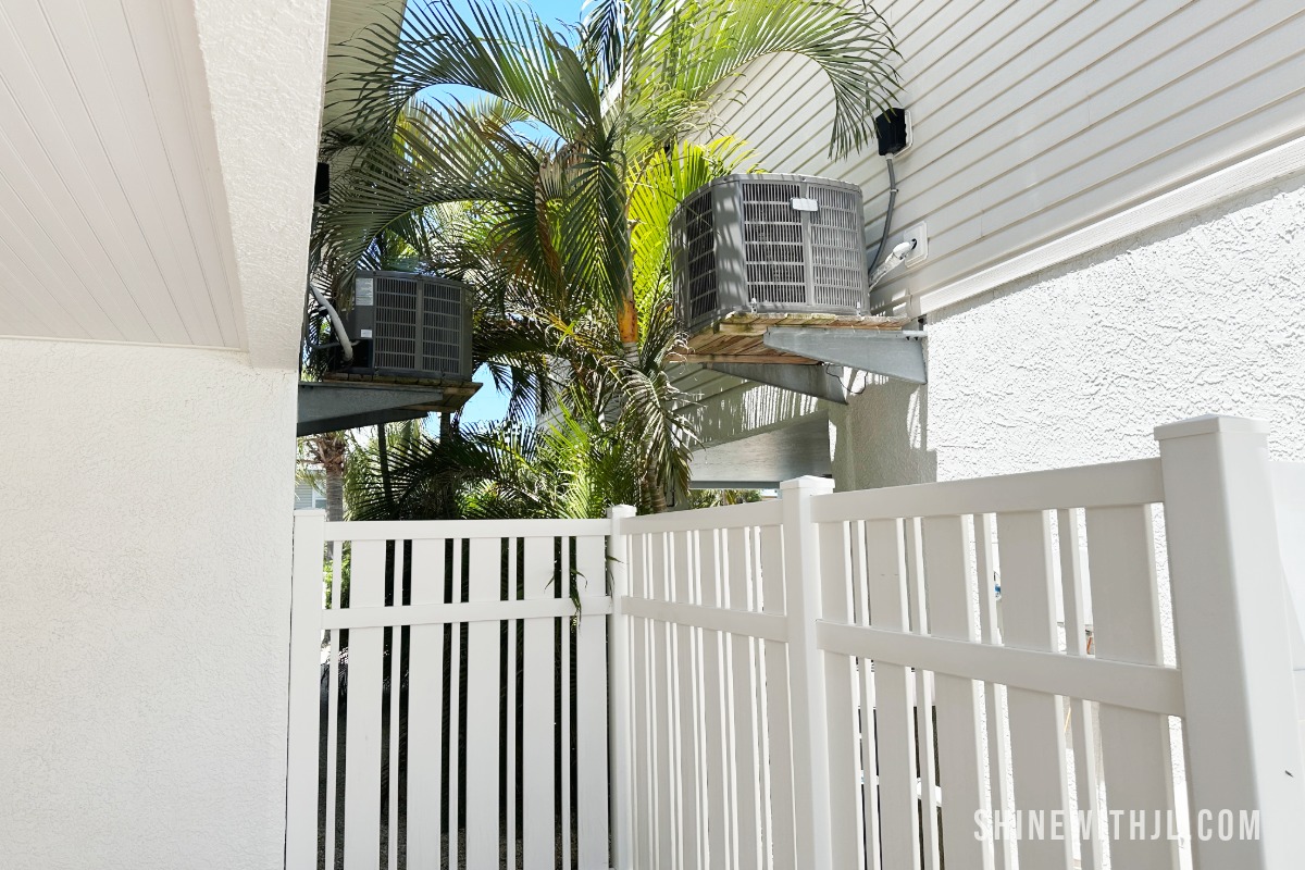 Palm trees hitting house in wind causing noise at night while traveling