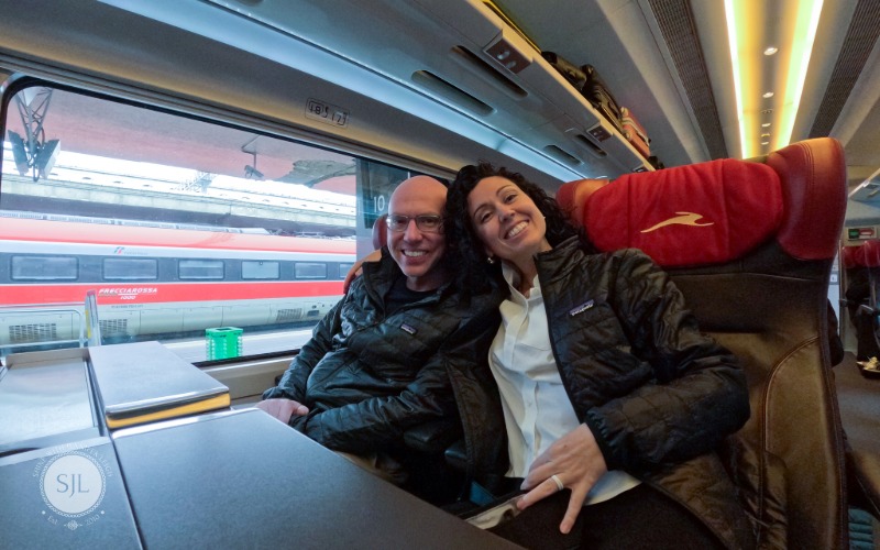 Italy Vacation Ways to Save Money Transportation ShinewithJL on Italian train on 3 week trip
