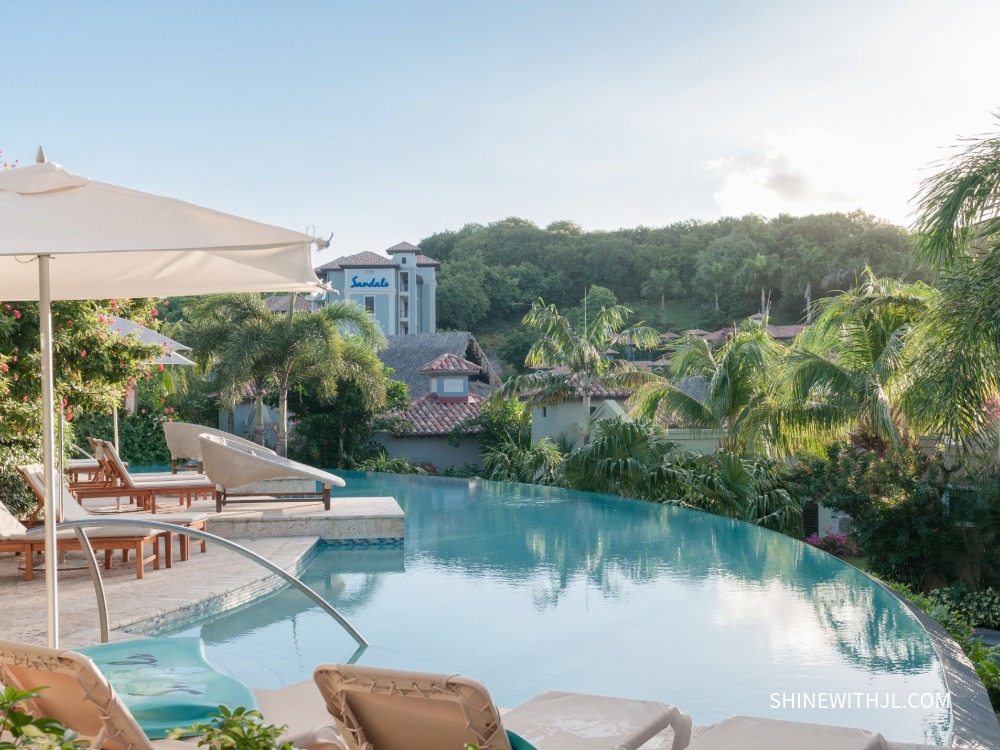 Sandals Grenada Pool and Lounge Chairs Pool with lounge chairs at Sandals Grenada, a romantic Caribbean resort for couples