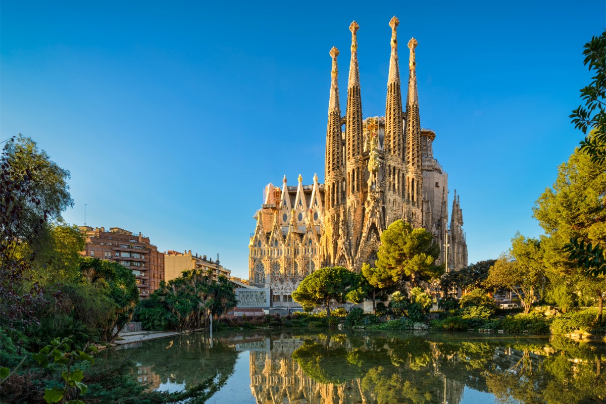 Sagrada Família in Barcelona Sagrada Família in Barcelona viewed across the pond and gardens