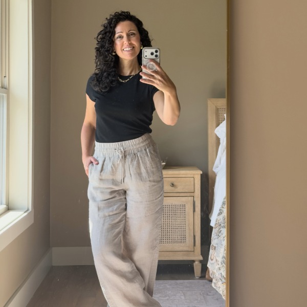 Black Merino Short-Sleeve Tee Black merino short-sleeve T-shirt styled with flax linen wide leg pants for Barcelona